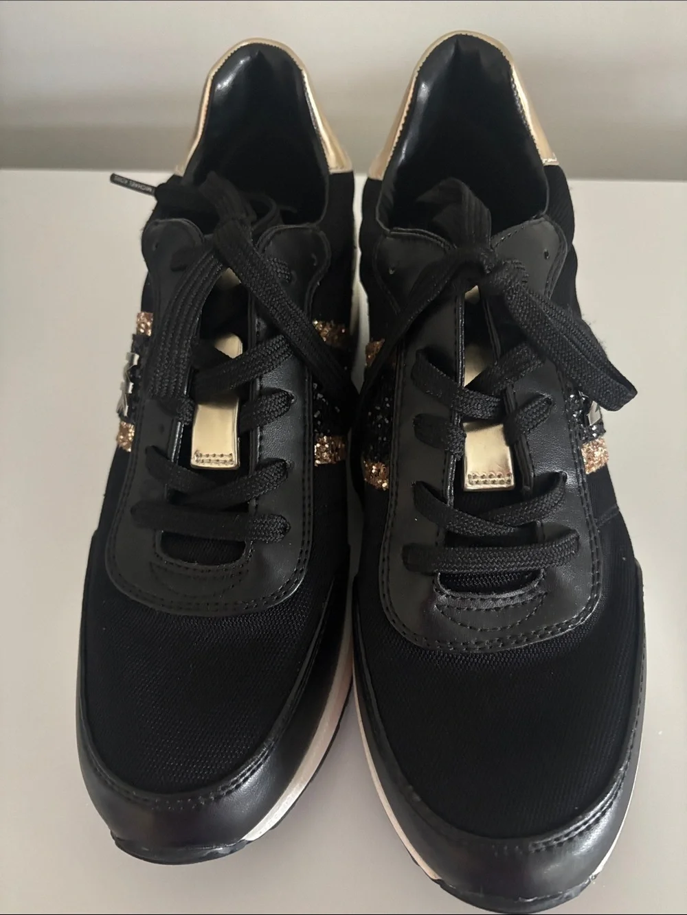 Michael Kors Black Sneakers with Gold Accents